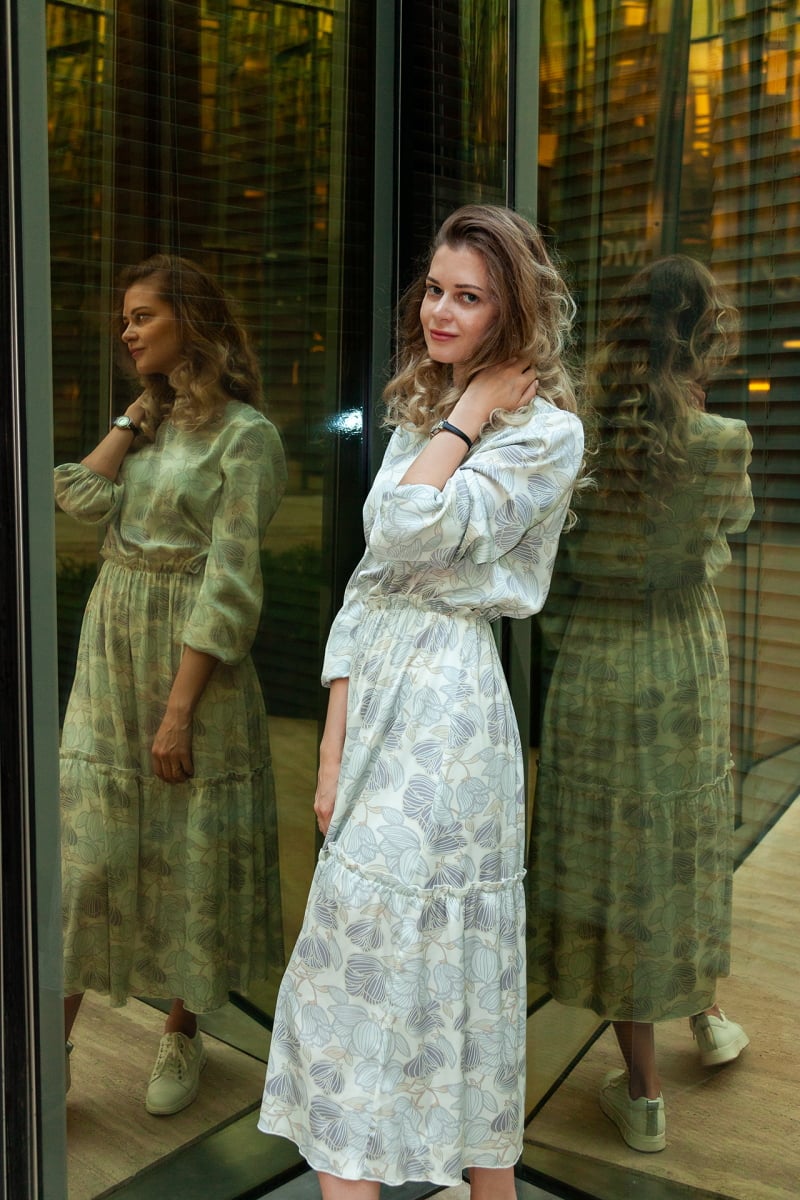 Girl portrait in a city glass corner GR13